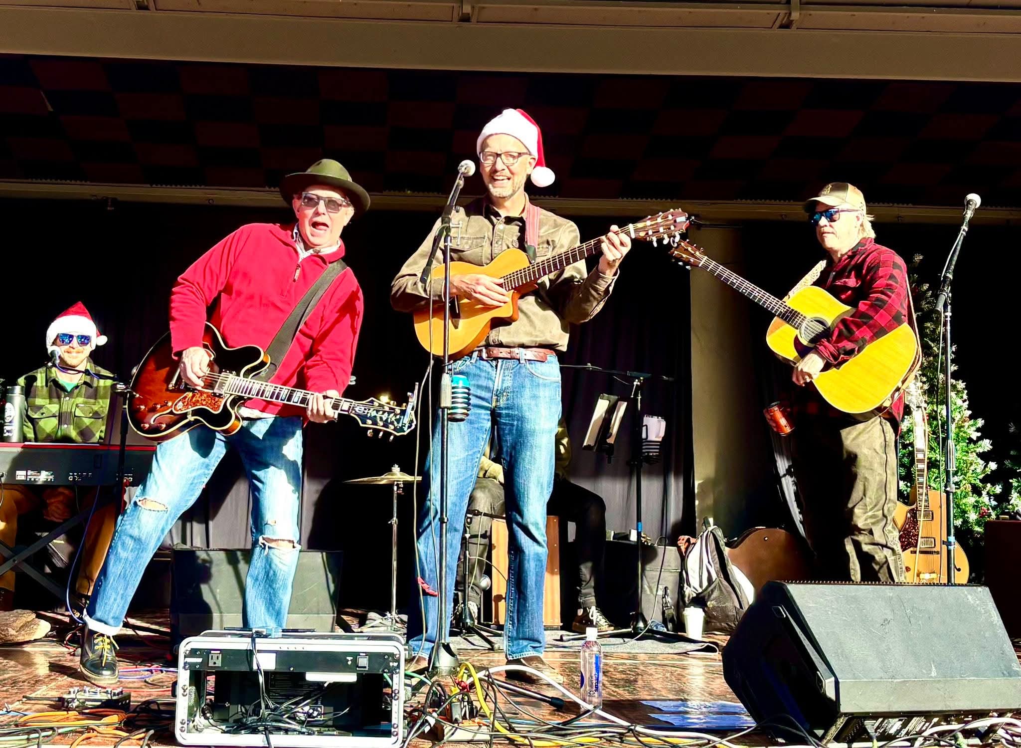 Wild Mountain Thyme playing a holiday show in Santa hats